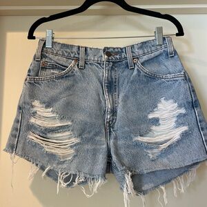Vintage Levi's Light Blue Distressed Jean Shorts